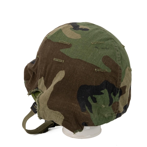 266 - Steinberg Bros American M1 tin helmet, liner and camouflage cover.