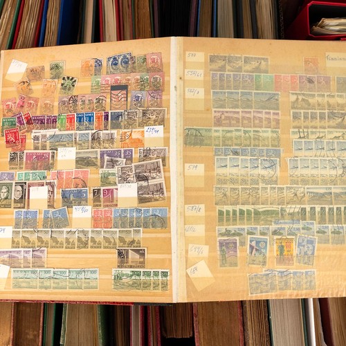 298 - A large collection of world and U.K. stamps, approximately 71 albums, some empty and partially full.