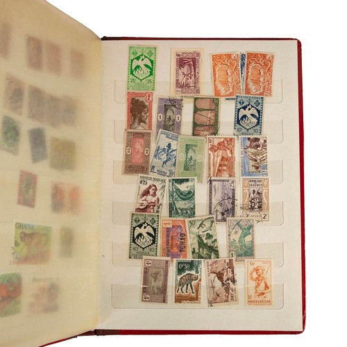 299 - A large collection of world and U.K stamps, contained in approximately 23 albums.