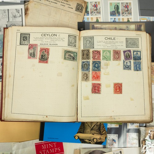 300 - A large collection of modern stamps, including presentation packs, first days, albums and others.