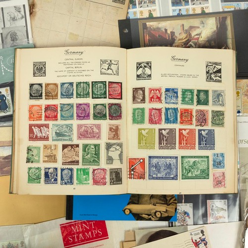 300 - A large collection of modern stamps, including presentation packs, first days, albums and others.