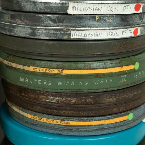 328 - Quantity of 9.5mm cine reels. Written titles include: Jackie's Fire Brigade (2 reels); Popeye; Coron... 