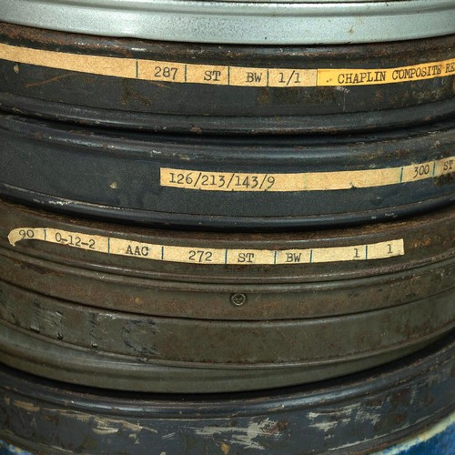 330 - Quantity of 9.5mm cine movie reels. Written titles include: Jimmy Adams Film (untitled); Holy Smoke;... 