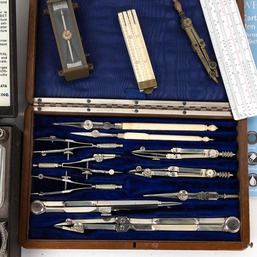 363 - Collection of deskinalia to include wooden cased draftsman's set, cased slide rule, scale rulers, bo... 