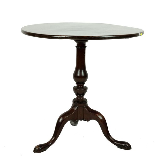 409 - Mahogany tilt top table, early 19th Century. Tripod base with turned baluster support. Diameter top ... 