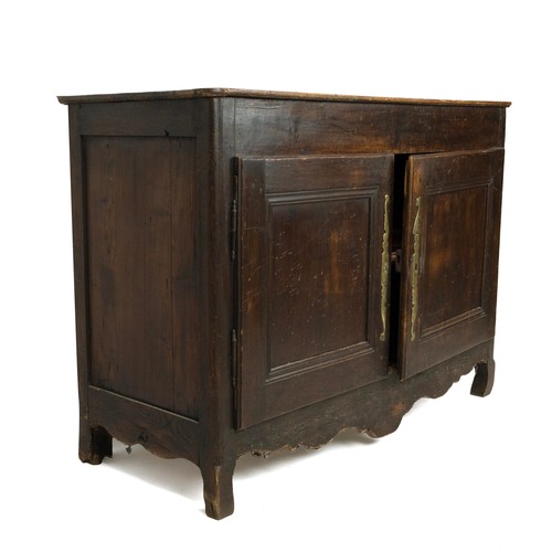 411 - 19th Century French/Dutch Pine dresser base. Shaped feet and skirt, two doors with brass lock plate ... 