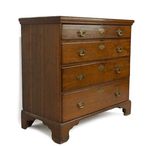 413 - Georgian straight front oak chest of drawers, early 19th Century. Shaped bracket feet, four graduate... 