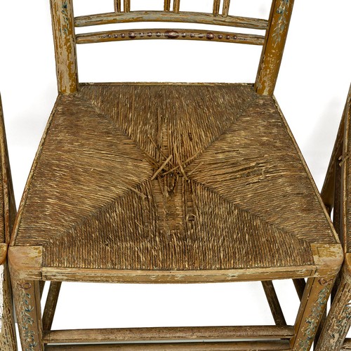 414 - Original paint Regency side chairs, c1820s. Beech frames with rush seat to each. Yellow ochre ground... 