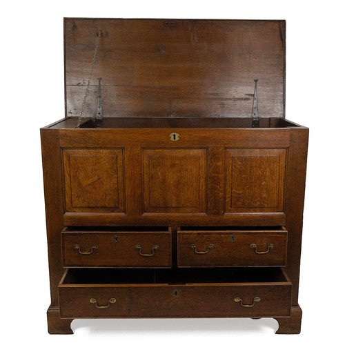 426 - George III oak mule chest. Three drawers with box above. Lid opens to reveal candle box with one rea... 