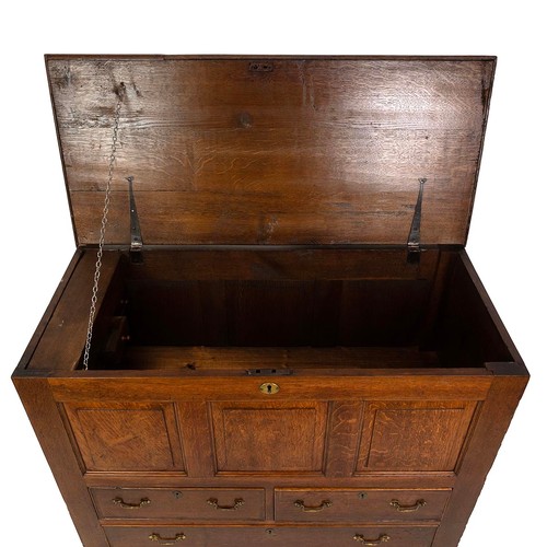 426 - George III oak mule chest. Three drawers with box above. Lid opens to reveal candle box with one rea... 