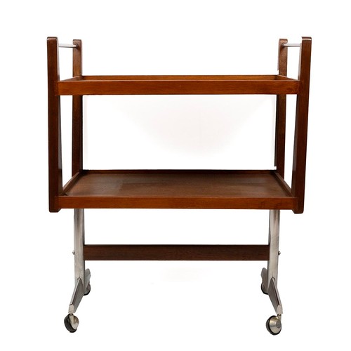 434 - 1970s two tiered teak and chrome push pull trolley, with chrome handrail raised on two chrome T supp... 