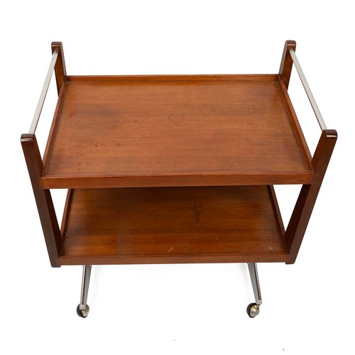 434 - 1970s two tiered teak and chrome push pull trolley, with chrome handrail raised on two chrome T supp... 