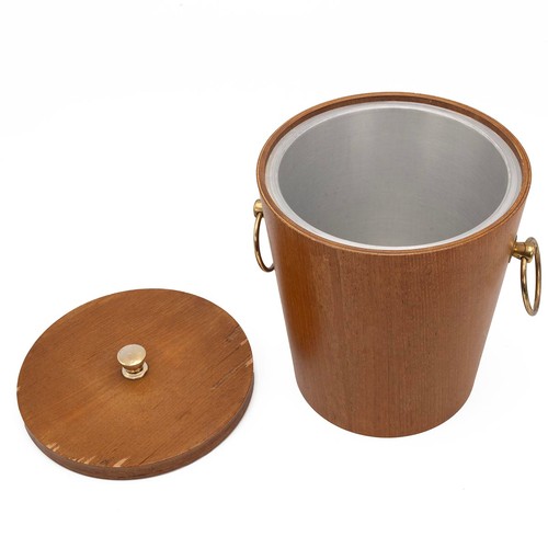 383 - A mid-Century teak ice bucket with brass ring handles and aluminium interior, 22cm high.