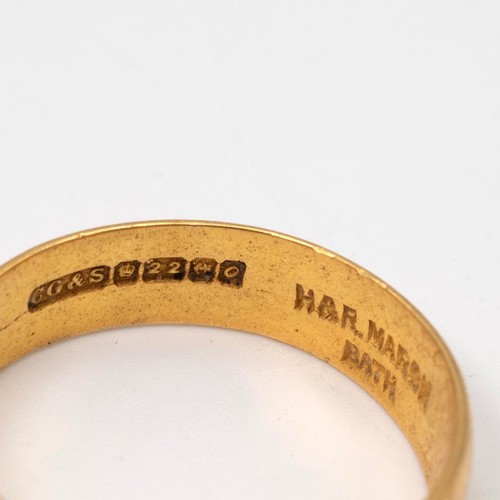 1 - A 22ct gold (cut) wedding band. 4.8 grams.