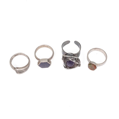 9 - Four vintage rings, to include a silver and agate ring, Birmingham 1971, size L 1/2; a silver and sa... 