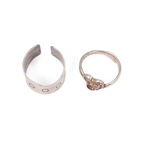 12 - Iluminada Mendes, a silver abstract ring, stamped 'Iluminada, 925', size N; along with a vintage sil... 