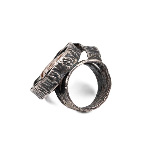 12 - Iluminada Mendes, a silver abstract ring, stamped 'Iluminada, 925', size N; along with a vintage sil... 