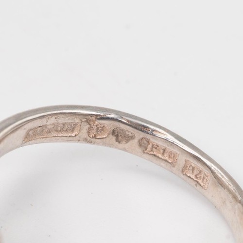 12 - Iluminada Mendes, a silver abstract ring, stamped 'Iluminada, 925', size N; along with a vintage sil... 