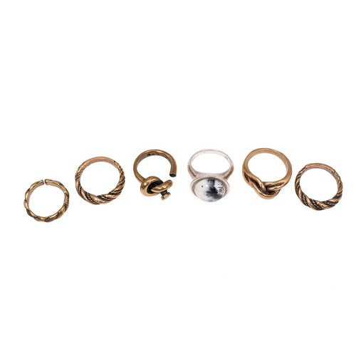 16 - A vintage Jorma Lane Finnish bronze ring, four other rings, and a modern silver moss agate set ring,... 