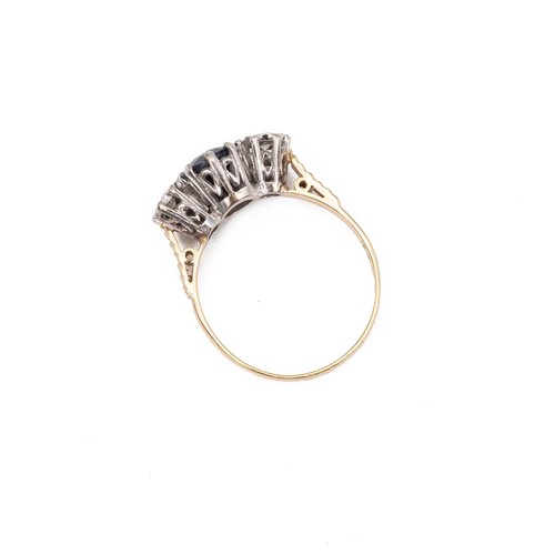 22 - An 18ct gold, sapphire and diamond ring, the two brilliant cut diamonds measuring approximately 0.20... 