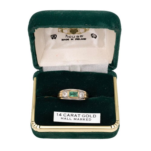 26 - An 18ct gold (tested) emerald and diamond ring, the central emerald flanked by two diamonds each 0.0... 