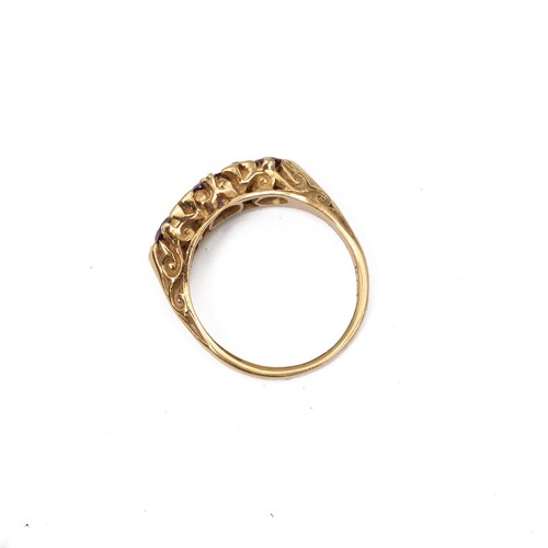 36 - Vintage 18ct gold hallmarked ruby and diamond ring, the centre stone flanked by four diamonds, size ... 