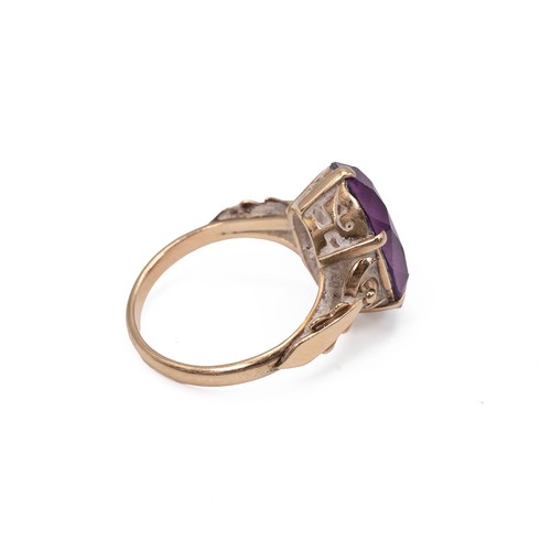50 - 14ct gold Amethyst dress ring of oval form set in a six claw setting approx 6ct, size M, weight 5.36... 