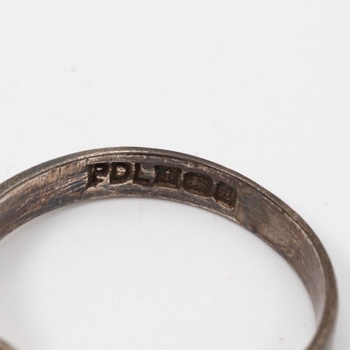 53 - A collection of silver and white metal rings, including an American college-style ring, various size... 