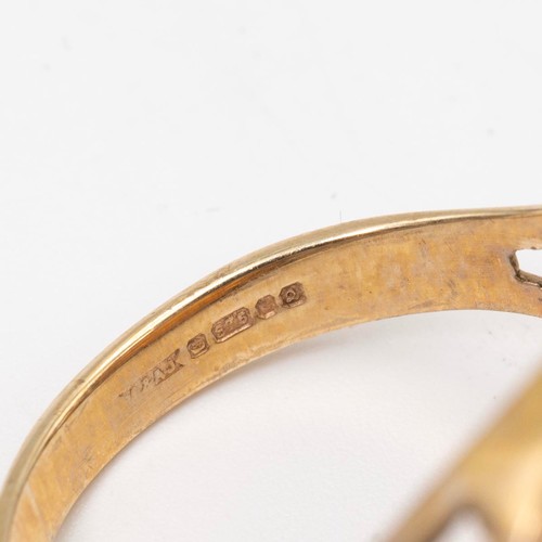 54 - A 9ct gold and 1982 half sovereign mounted ring, size S, 7.3 grams.