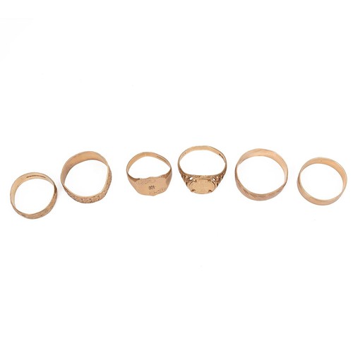 56 - A collection of 9ct gold bands and signet rings, gross weight 14.4 grams