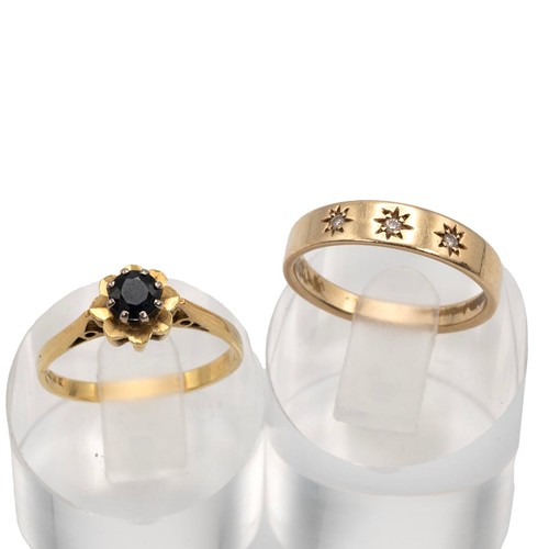 73 - 18ct and 10k gold rings, the 18ct set with a single sapphire in a flower head, size P, weight 2.7 gr... 