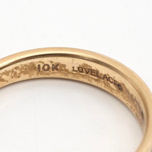 73 - 18ct and 10k gold rings, the 18ct set with a single sapphire in a flower head, size P, weight 2.7 gr... 