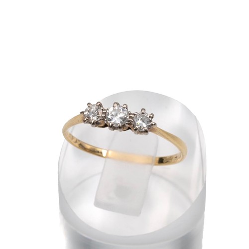 74 - 18ct three stone brilliant cut diamond ring, centre stone approx 0.10ct, flanked by two diamonds app... 