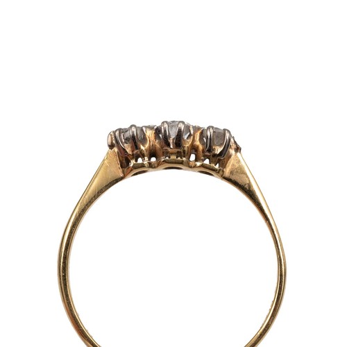 74 - 18ct three stone brilliant cut diamond ring, centre stone approx 0.10ct, flanked by two diamonds app... 