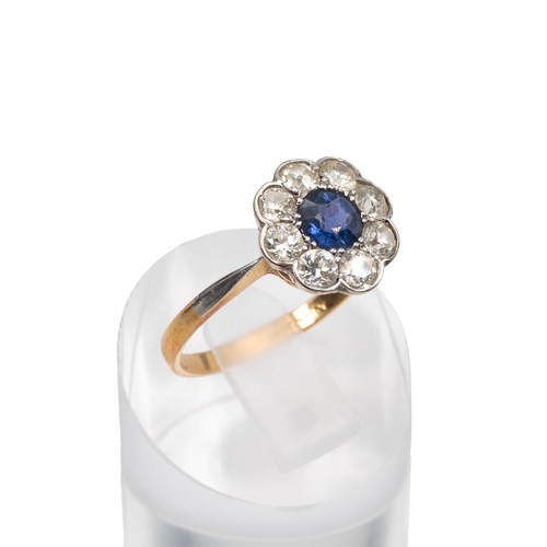 80 - 18ct gold sapphire and diamond ring, central stone, approx 0.5ct surrounded by eight 0.07ct diamonds... 