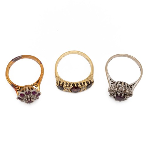 84 - An 18ct gold, diamond and garnet set ring, size N 1/2, along with two other 18ct gold cluster rings,... 