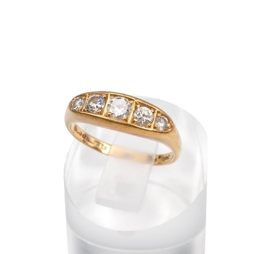 86 - An 18ct gold and five stone diamond ring, the brilliant cut diamonds measuring approximately 0.73 ca... 