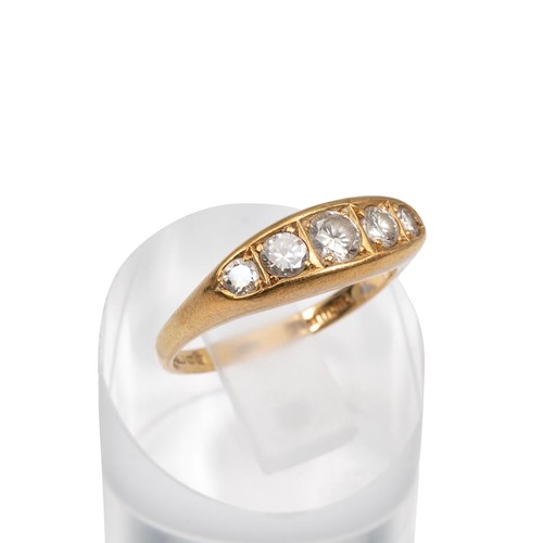 86 - An 18ct gold and five stone diamond ring, the brilliant cut diamonds measuring approximately 0.73 ca... 
