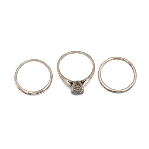 90 - Three 9ct white gold rings, wedding band, eternity and a diamond 9ct white gold, centre stone approx... 