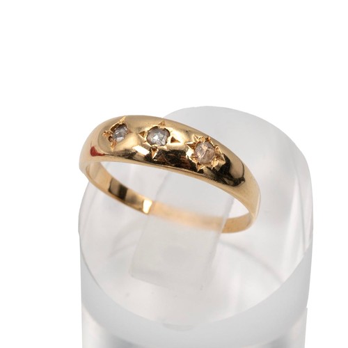 95 - 18ct gold hallmarked Gypsy style ring set with three diamonds, size O, weight 2.4 grams.