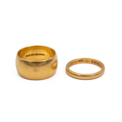 96 - Two 22ct gold hallmarked wedding bands, size J and L, gross weight 13.56 grams.