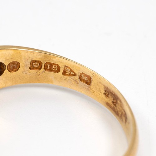 100 - 18ct gold gypsy style ring set with a central ruby approx 0.15ct, flanked by two diamonds each, appr... 