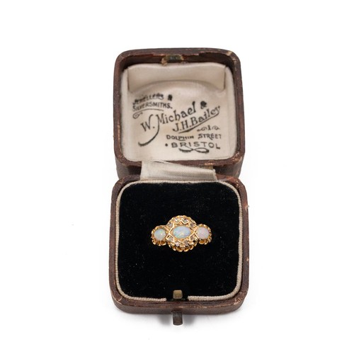 103 - Vintage 18ct hallmarked gold diamond opal ring, set with three opals of oval form, the centre stone ... 