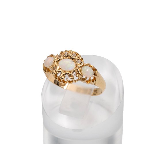 103 - Vintage 18ct hallmarked gold diamond opal ring, set with three opals of oval form, the centre stone ... 