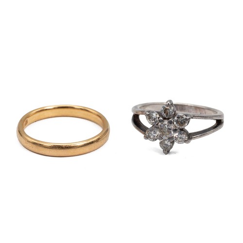 109 - 22ct gold hallmarked wedding band, size P, weight 3.9 grams, and a silver gem-set flower petal ring ... 