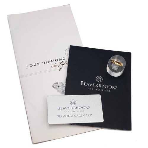 117 - An 18ct gold hallmarked solitaire brilliant cut diamond ring with certificate 2-10217, the diamond 0... 