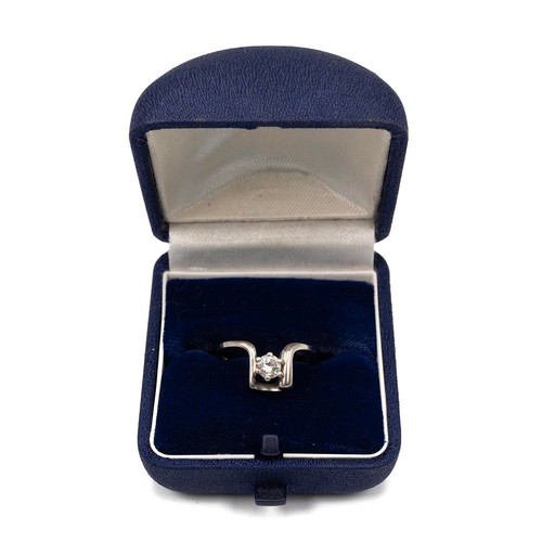 120 - A 14ct white gold and diamond ring, the brilliant cut diamond measuring approximately 0.3 carats, in... 