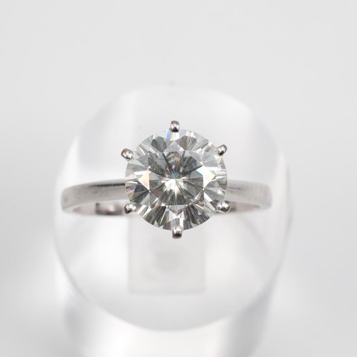 122 - CZ diamond solitaire ring, hallmarked 750, size Q, weight 4.1 grams.