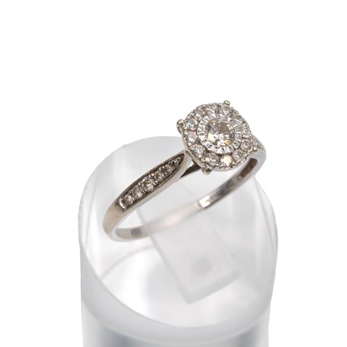 123 - 9ct gold designer diamond ring, the centre stone approximately 0.2ct surrounded by 12 brilliant cut ... 