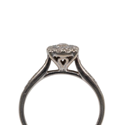 123 - 9ct gold designer diamond ring, the centre stone approximately 0.2ct surrounded by 12 brilliant cut ... 